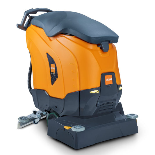 Die TASKI ULTIMAXX 1900 RB55 Performance BMS 40A von Diversey Deutschland ist eine orange/graue Scheuersaugmaschine der nächsten Generation mit Radantrieb, 43L Tank, 55cm Doppelwalze, kompaktem Design und sichtbaren Bedienelementen für die industrielle Reinigung.