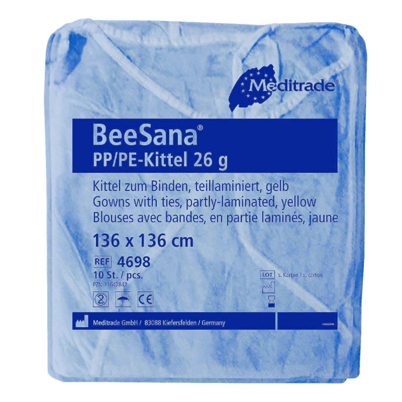 Een in een blauwe verpakking geleverde Meditrade BeeSana® PP/PE-jas van 26 g, verpakt per 10 stuks, voorzien van een opschrift met productgegevens zoals materiaal, kleur, maat en verpakkingshoeveelheid. Deze jas is bedoeld als bescherming.