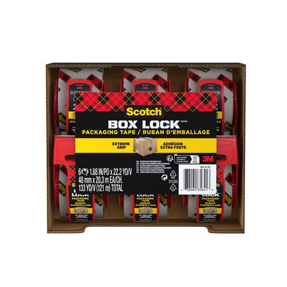 Un carton contient six rouleaux de ruban d'emballage Scotch® Box Lock™ 48 mm x 20,3 m de 3M Deutschland GmbH, chacun avec un distributeur rouge. L'étiquette indique "Extreme Grip" et "Extra Strong" ainsi que les dimensions et le branding 3M.