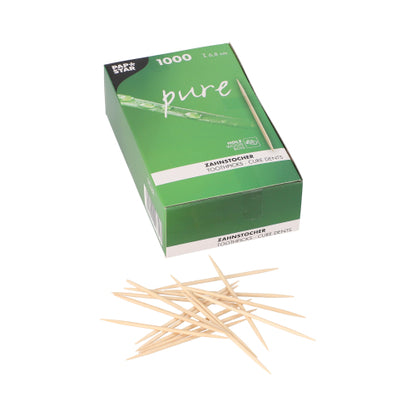 Een groene "pure" doos met de opdruk PAPSTAR tandenstokers rond van FSC-gecertificeerd hout, 6,8 cm (1000 stuks) toont aan de voorkant verspreide tandenstokers; de verpakking bevat productinformatie in meerdere talen.