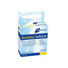 Auf einem blau-weißen Karton der Meditrade GmbH mit der Aufschrift „Auslaufartikel: BeeSana® SafeCut Fingerpflasterverband“ (150 Stück) sind Produktdetails, Größe (2,5 cm x 4,5 m) und wichtige Merkmale zur Anwendung als Fingerpflaster in mehreren Sprachen abgebildet.