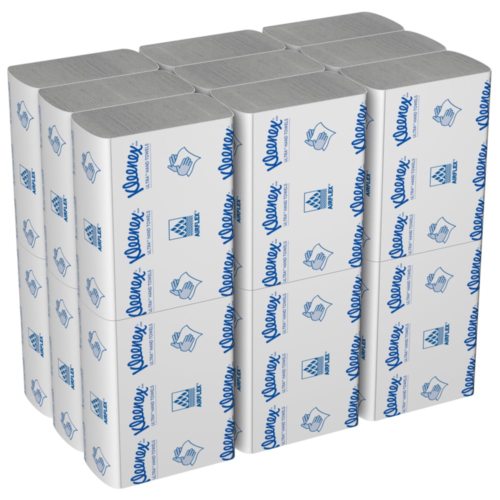 Een doos Kleenex® Ultra™ Handdoeken van Kimberly-Clark GmbH bevat 18 witte MultiFold-pakketjes à 150 vellen met blauwe teksten en symbolen op de verpakking.