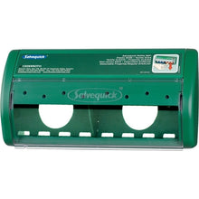 Un distributeur de pansements Salvequick Orkla Wound Care AB vert, vide | Emballage (1 pièce), dispose de deux ouvertures rondes, d'un couvercle transparent, d'instructions imprimées en haut à droite et d'un marquage visible à l'avant.