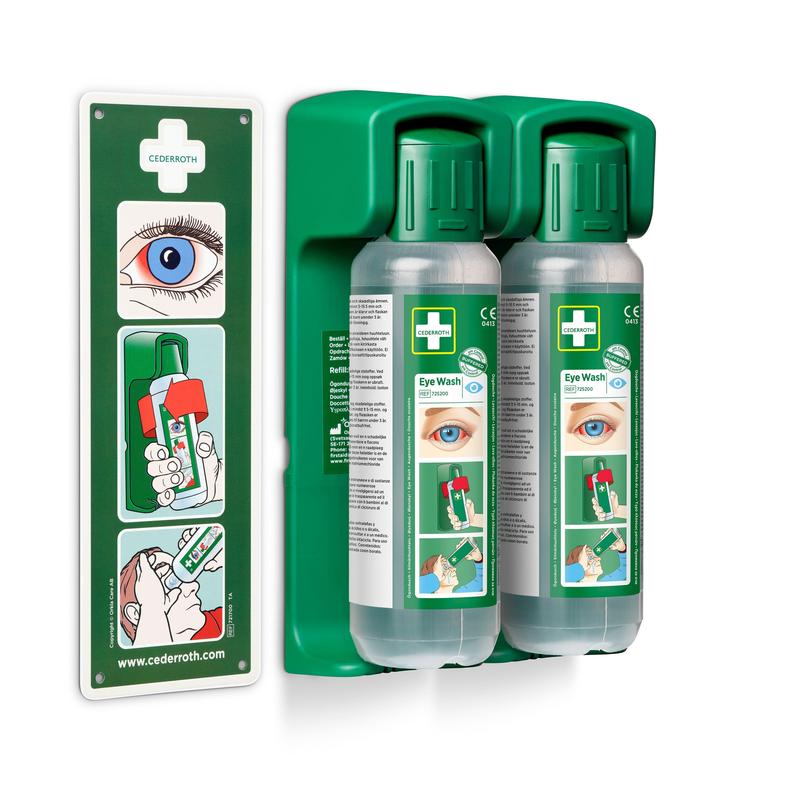 Twee 500 ml oogspoelflessen van Orkla Wound Care AB zijn gemonteerd in een wandhouder (voor oogspoeling 500 ml, 1 stuk); een gloeiend waarschuwingsbord voor noodgevallen is inbegrepen.