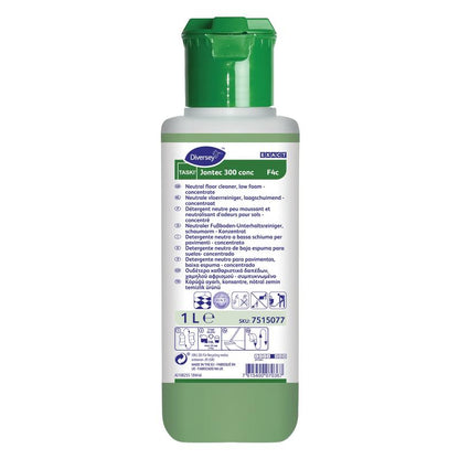 Een 1-literfles TASKI Jontec 300 conc vloerreiniger hoogconcentraat van Diversey Deutschland GmbH & Co. OHG heeft een groene dop, een wit etiket met meertalige instructies en zorgt voor een stralende glans op vloeren.