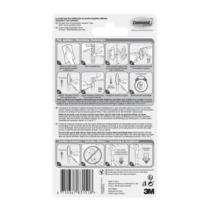 Le dos du crochet de design large pour salle de bain Command™, 17083B de 3M Deutschland GmbH, montre un guide illustré étape par étape pour fixer et retirer les crochets de salle de bain sans perçage, avec un texte multilingue et des informations sur le produit en bas.