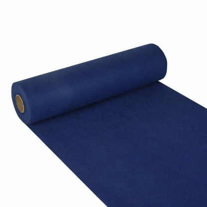 De Starpak tafelloper, stofachtig, vlies „Soft Selection“ (24 m x 40 cm), is een gladde, gelijkmatig gekleurde donkerblauwe rol, die gedeeltelijk is uitgerold, zodat de binnenste kartonnen buis zichtbaar is – perfect voor decoratie of als stijlvolle tafelloper.