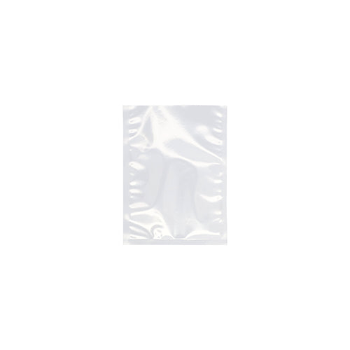 Un sachet à souder Starpak 100, PA/PE transparent de Starpak est centré sur un fond blanc. Le sac scellé, légèrement réfléchissant, est idéal comme sachet sous vide pour aliments ou à utiliser avec une machine à vide à cloche. De légères plis et textures sont visibles.