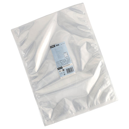 Un paquet de 100 sacs transparents Starpak à bord scellé PA/PE est empilé et légèrement éventé sur un fond blanc. Au centre se trouve une étiquette avec les informations sur le produit.