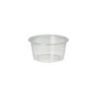 De Starpak 50 dressingbeker, PP, rond, Ø 7,1 cm, transparant, van Starpak heeft gladde zijkanten en een licht omgeslagen rand, ideaal voor de cateringsector, afgebeeld tegen een eenvoudige witte achtergrond.