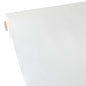 La nappe Starpak, en non-tissé semblable à du tissu « soft selection » (40 m x 1,18 m) en blanc est partiellement déroulée, montrée avec sa structure lisse et légère et le noyau en carton visible.