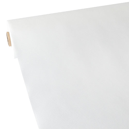 Un gros plan de la nappe Starpak, semblable à du tissu, en non-tissé « soft selection » (40 m x 0,9 m, blanc), montrant le rouleau avec un noyau en carton déroulé en biais - idéal pour les travaux manuels ou comme nappe moderne.