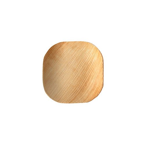 La PAPSTAR 25 assiette en feuille de palmier « pur » de la PAPSTAR GmbH est une petite assiette carrée avec des bords arrondis en feuille de palmier clair. Son design écologique se distingue par son grain naturel unique et est présenté sur un fond blanc simple.