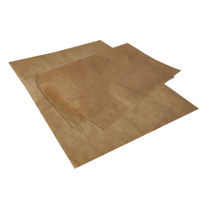 Deux papiers d'emballage superposés PAPSTAR, substitut de parchemin 35 cm x 25 cm résistant à la graisse de la PAPSTAR GmbH, reposent sur un fond blanc. Le coin ondulé d'une feuille souligne sa texture fine, semi-transparente et résistante à la graisse.
