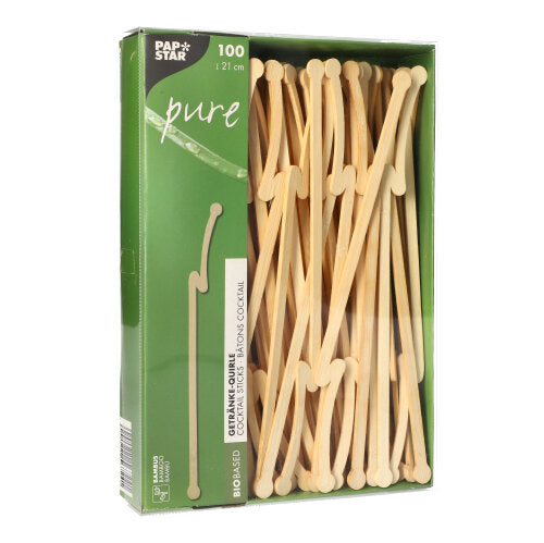 Een groene doos met het opschrift 'PAPSTAR pure' van PAPSTAR GmbH bevat 100 drankroerders van bamboe met een lengte van elk 12 cm. De biologisch afbreekbare roerders zijn zichtbaar door een kijkvenster aan de voorkant van de verpakking.