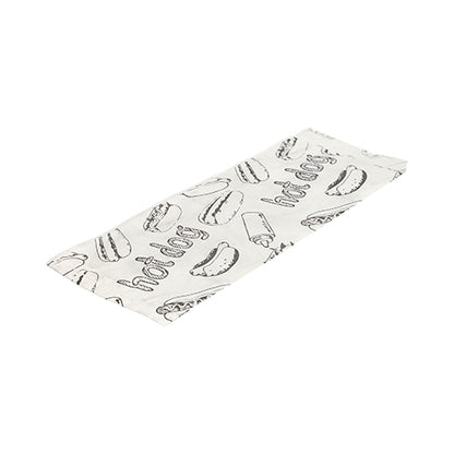 L'image montre un emballage en papier plat et blanc PAPSTAR pour hot-dog (21x8,5 cm) avec un dessin de hot-dog en noir et le texte "Hot Dog" provenant du paquet rétractable de 1000 unités de PAPSTAR GmbH sur fond blanc.
