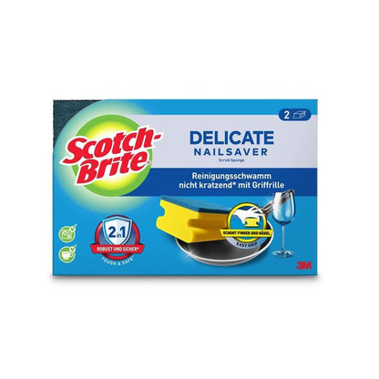 Afgebeeld is een doos Scotch-Brite® Delicate niet-krassende greepspons van 3M Deutschland GmbH met een verpakking die productafbeeldingen, het Scotch-Brite-logo en een Duitse tekst voor krasvrij reinigen op gevoelige oppervlakken bevat.
