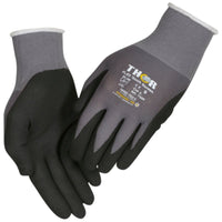 Une paire de gants de travail Thor Flex gris et noirs de la marque Abena Re-Seller GmbH, portant l'inscription « THOR » et les certificats de sécurité sur l'un des gants, le tout représenté sur fond blanc.