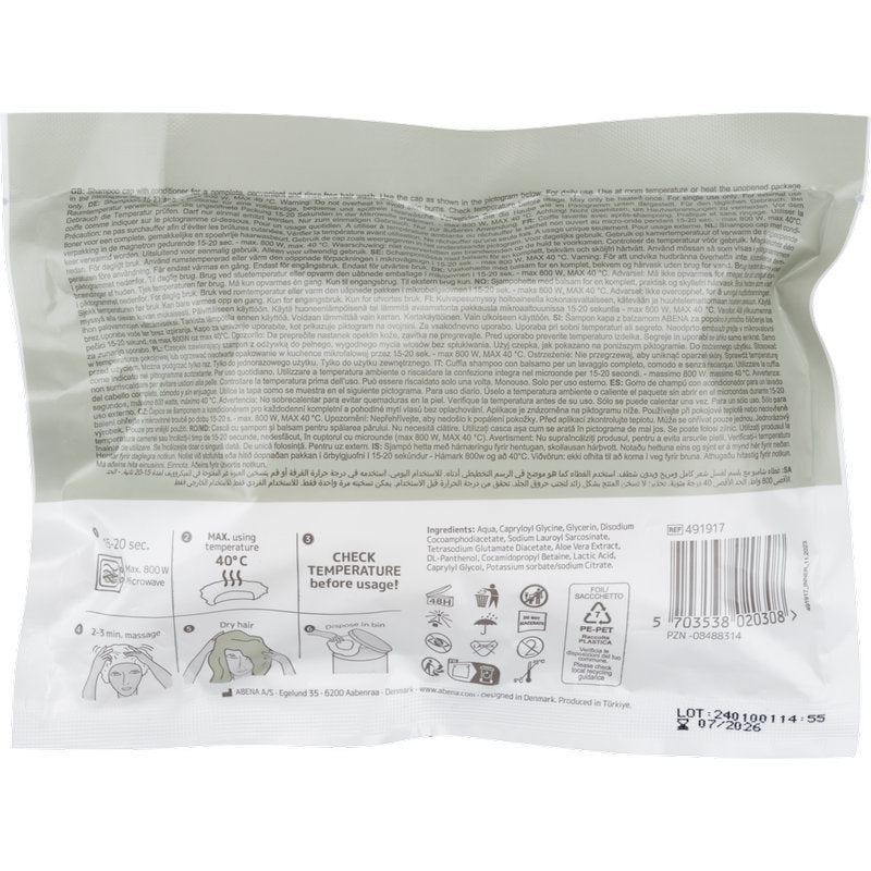 Op de achterkant van de Abena Re-Seller GmbH shampoo-kap, ø 32 cm, wit (1 stuk) verpakking bevinden zich gebruiksinstructies, veiligheidsinstructies, temperatuurrichtlijnen, grafieken in zwart/grijs op wit, barcode en instructies voor haar wassen zonder water.