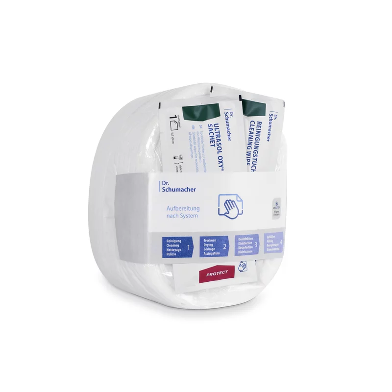 Un paquet de lingettes en non-tissé Dr. Schumacher GmbH Eco Wipes pour la désinfection des surfaces, avec des lingettes emballées individuellement dans un récipient en plastique transparent et arrondi, étiqueté avec des informations sur le produit et des instructions d'utilisation.