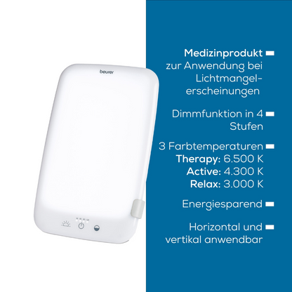 Image de la lampe de luminothérapie Beurer TL 35 sur fond blanc. La lampe est blanche et rectangulaire avec des bords arrondis. Le texte dans l'image décrit les fonctionnalités du produit, y compris la luminosité réglable avec un variateur, trois températures de couleur et l'efficacité énergétique. Le produit est fabriqué par la société Beurer GmbH et livré dans un emballage avec une seule pièce.