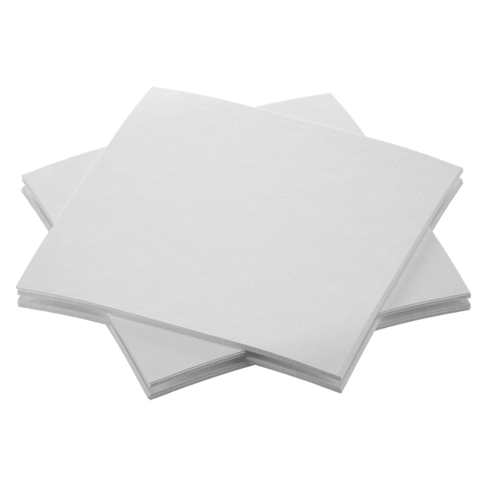 Een stapel biologische Dunisoft® servetten van Duni GmbH, kriskras op een witte ondergrond gerangschikt. De servetten hebben een stofachtige textuur, zijn ongebruikt en netjes op een rij gelegd.
