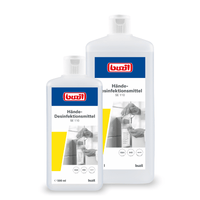 Deux flacons de « Buzil Désinfectant pour les mains SE 110, prêt à l'emploi » de la société BUZIL-WERK Wagner GmbH & Co. KG, disponibles en formats de 500 ml et 1 L, munis d'une étiquette sur laquelle figure une personne utilisant le désinfectant. Le texte en allemand met en avant les propriétés respectueuses de la peau et bactéricides du produit et comporte plusieurs symboles de certification.