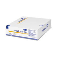 Een gesloten wit-blauwe doos met het opschrift „Paul Hartmann AG Foliodress® Cap „universal“ Comfort operatiemutsen wit“ bevat vliesmutsen en aan de zijkant een tekst met gedetailleerde productkenmerken.