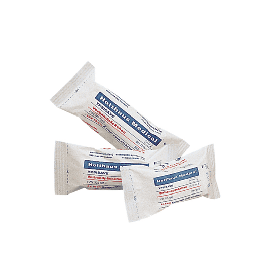 Trois boîtes de pansements Holthaus Medical YPSISAVE, stériles, portant chacune des inscriptions en bleu et en rouge, sont exposées. Le texte figurant sur l'emballage est vraisemblablement en allemand et contient des informations sur le produit. Chaque boîte est emballée individuellement et scellée, ce qui indique qu'il s'agit de pansements stériles de la société Holthaus Medical GmbH & Co. KG.