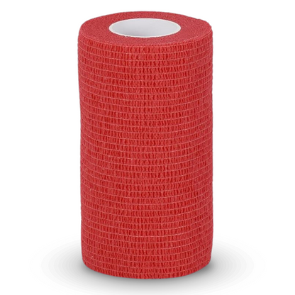 Un rouleau cylindrique rouge de bandage auto-adhésif Holthaus VliVet® pour le domaine vétérinaire de Holthaus Medical GmbH & Co. KG, conçu pour adhérer à lui-même sans coller à la peau ou aux poils. Le rouleau est debout sur un fond blanc simple, avec un noyau creux visible au centre - idéal pour une utilisation dans le soin des sabots et le domaine vétérinaire.