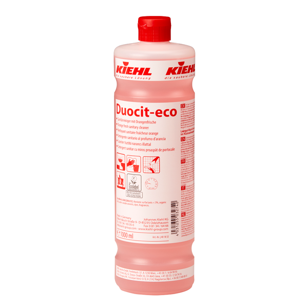 La bouteille de 1 litre du nettoyant sanitaire Kiehl Duocit-eco à la fraîcheur d'orange de Johannes Kiehl KG a un bouchon rouge et une étiquette avec des informations multilingues. La bouteille contient un liquide rose pour un nettoyage écologique et laisse un parfum frais d'orange.