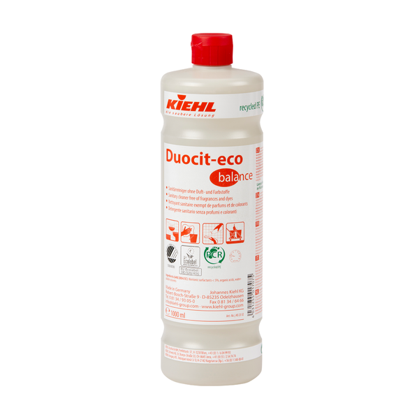 Een 1-liter kunststof fles Johannes Kiehl KG Kiehl Duocit-eco balance sanitairreiniger zonder geur- en kleurstoffen met rode dop en wit etiket met rode en zwarte productinformatie, symbolen en toepassingsinstructies.
