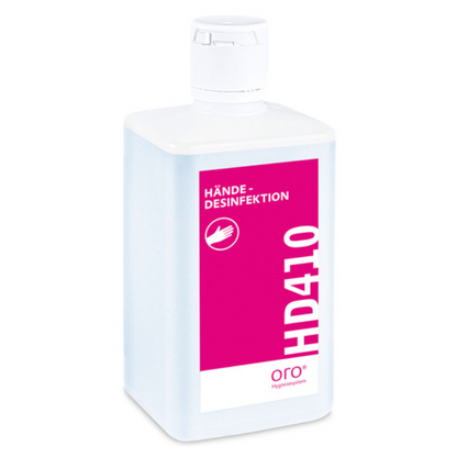 Une bouteille en plastique blanche avec un bouchon blanc et une étiquette rose porte l'inscription "Orochemie HD 410 Désinfection des mains" de la société orochemie GmbH + Co KG et est ornée d'un symbole de main pour la désinfection hygiénique des mains.