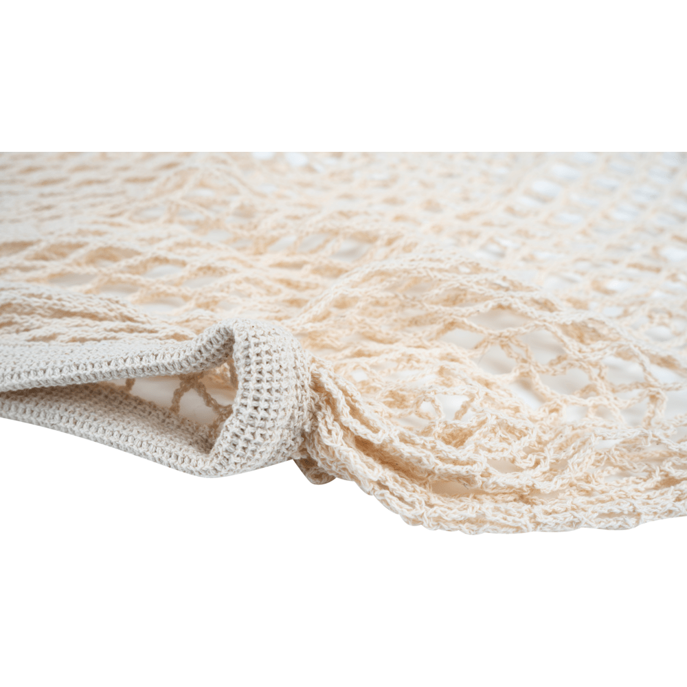 Close-up van een beige ENA Living boodschappennet van Abena Re-Seller GmbH - los geweven, herbruikbaar net, ideaal voor milieuvriendelijk winkelen; verkrijgbaar in een doos met 24 verpakkingen.