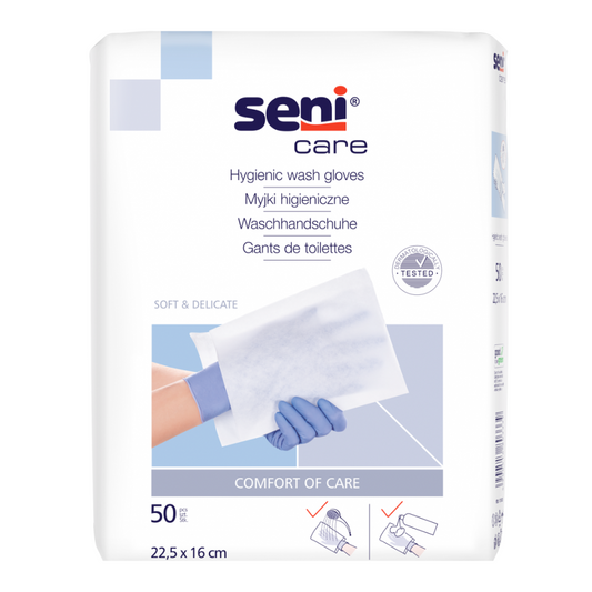 Eine Packung Seni Care Waschhandschuhe von TZMO Deutschland GmbH wird ausgestellt. Auf der Vorderseite sind Produktdetails hervorgehoben, darunter Abmessungen (22,5 x 16 cm), Menge (50 Stück) und ein Bild einer behandschuhten Hand, die einen gefalteten Handschuh aus weichem Vliesstoff hält. Etiketten in mehreren Sprachen betonen den Qualitätsstatus der Pflegeprodukte.