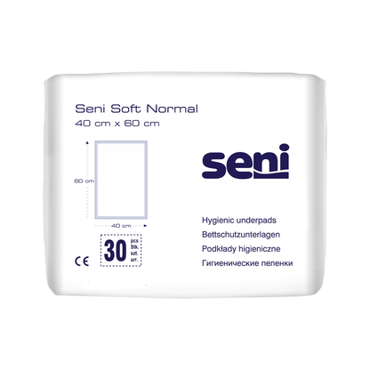 Un paquet de protections de lit Seni Soft Normal de TZMO Deutschland GmbH (40 x 60 cm). L'emballage blanc avec du texte bleu et des graphiques contient 30 pièces et offre une protection fiable et des informations en plusieurs langues.