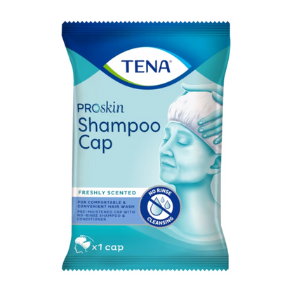 Le bonnet de lavage TENA ProSkin Shampoo Cap de TENA - Essity Germany GmbH est présenté dans un emballage au design bleu et blanc, sur lequel est représentée une personne utilisant ce bonnet jetable. Le texte souligne « Parfumé frais », « Nettoyage sans rinçage » et comprend à la fois « Shampooing et après-shampooing ». Contient un bonnet.