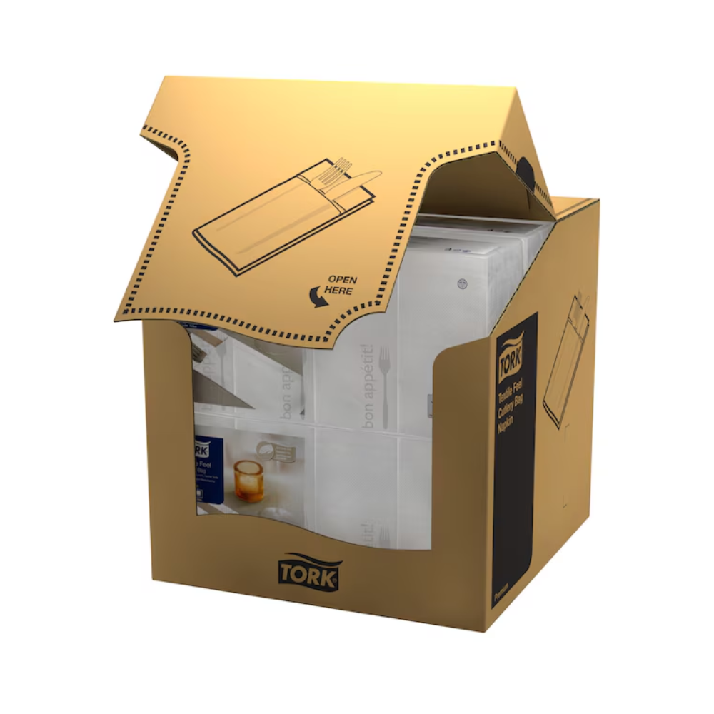 Een gedeeltelijk geopende doos met het opschrift "Tork 13662 Tork Soft Guten Appetit Bestekzakje | Karton (6 verpakkingen)" van het merk TORK - Essity Professional Hygiene Germany GmbH bevat witte papieren servetten, ook wel papieren servetten genoemd. De doos heeft een geperforeerde opening voor gemakkelijke toegang en bevat een afbeelding die laat zien hoe deze geopend moet worden, met op de bovenklep duidelijk zichtbaar "Hier openen".