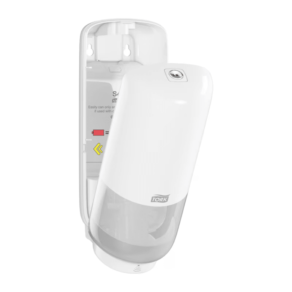 De wandgemonteerde Tork 561600 huidverzorgingsdispenser met Intuition Sensor Elevation S4 van TORK - Essity Professional Hygiene Germany GmbH heeft een open voorzijde in wit. Het transparante onderste deel biedt zicht op de zeepcontainer, terwijl in het open binnenwerk installatie- en navulinstructies en pijlen worden weergegeven, wat zorgt voor eenvoudig onderhoud van de contactloze dispenserfunctie.