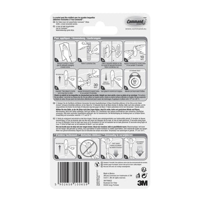 Arrière d'un emballage de crochet pour serviettes de bain Command™ de 3M Deutschland GmbH, avec des instructions illustrées pour l'application et le retrait, des consignes de sécurité et des informations sur le produit en plusieurs langues. Logo 3M et code-barres illustrés en bas.