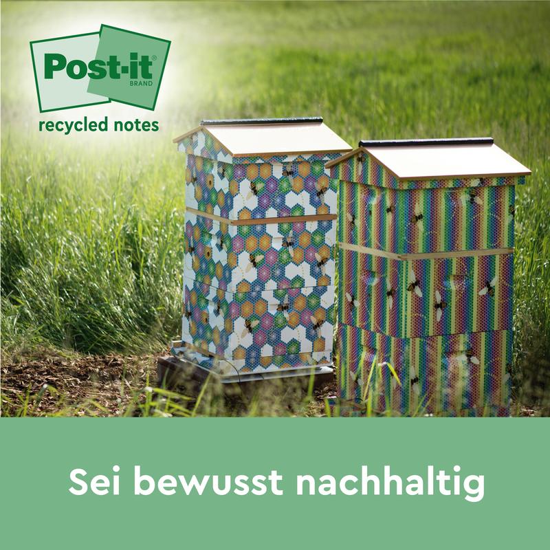 Twee levendige bijenkorven staan in een grasveld. Links bovenaan is het Post-it® Recycling Notes (76 x 76 mm, 100 vellen/blok, 100% PEFC) logo van 3M Deutschland GmbH te zien. De onderste Duitse tekst luidt: "Sei bewust duurzaam.