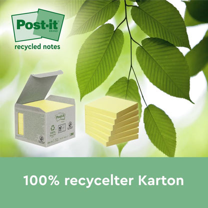 Une boîte de Post-it® Super Sticky 100 % Notes Recyclées (76x76 mm, 70 feuilles, PEFC) de 3M est placée à côté d'une pile de notes avec des feuilles vertes en arrière-plan. Le texte indique "Carton 100% recyclé" et "notes recyclées".